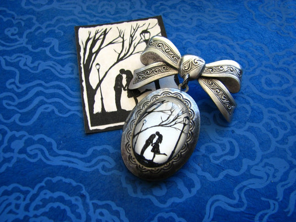 Autumn Kiss Brooch - locket pendant on bow pin - Silhouette Jewelry