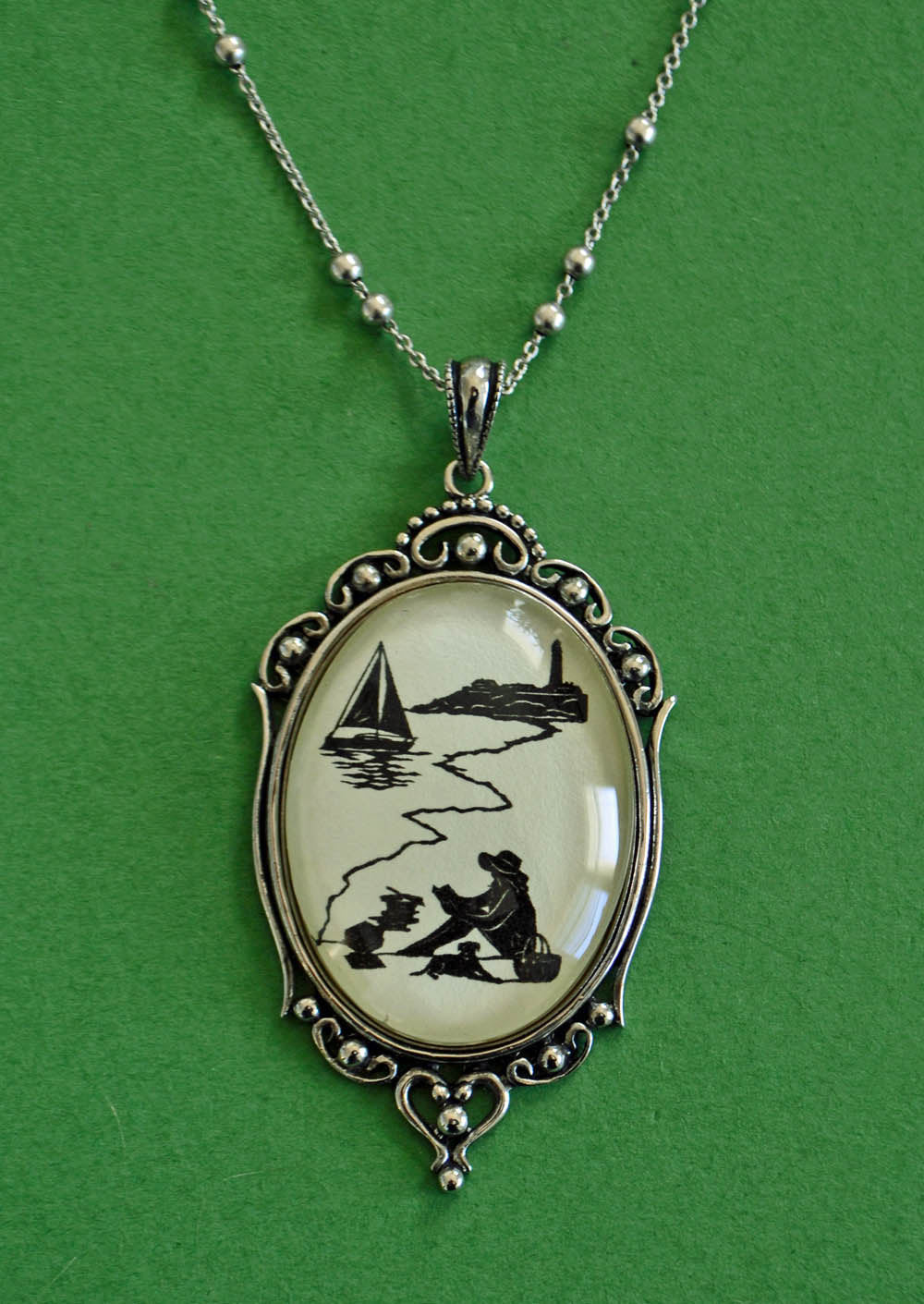 AFTERNOON READING on the BEACH Necklace, pendant on chain - Silhouette Jewelry